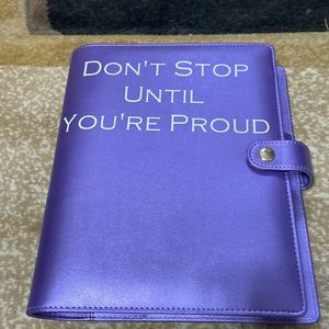 Notebook with daily goal sheets and fitness